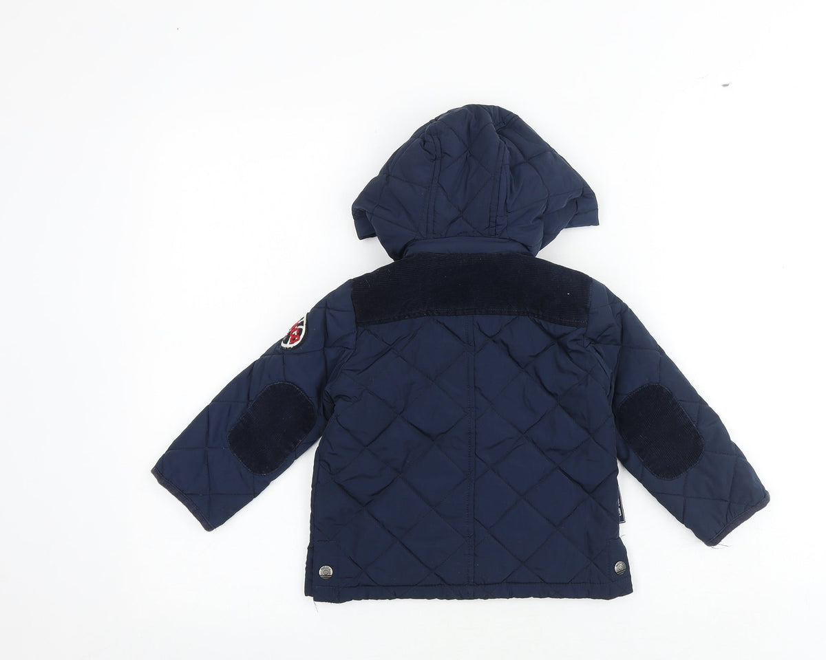 Back view of Freestyle boys’ blue jacket, size 2, years zip