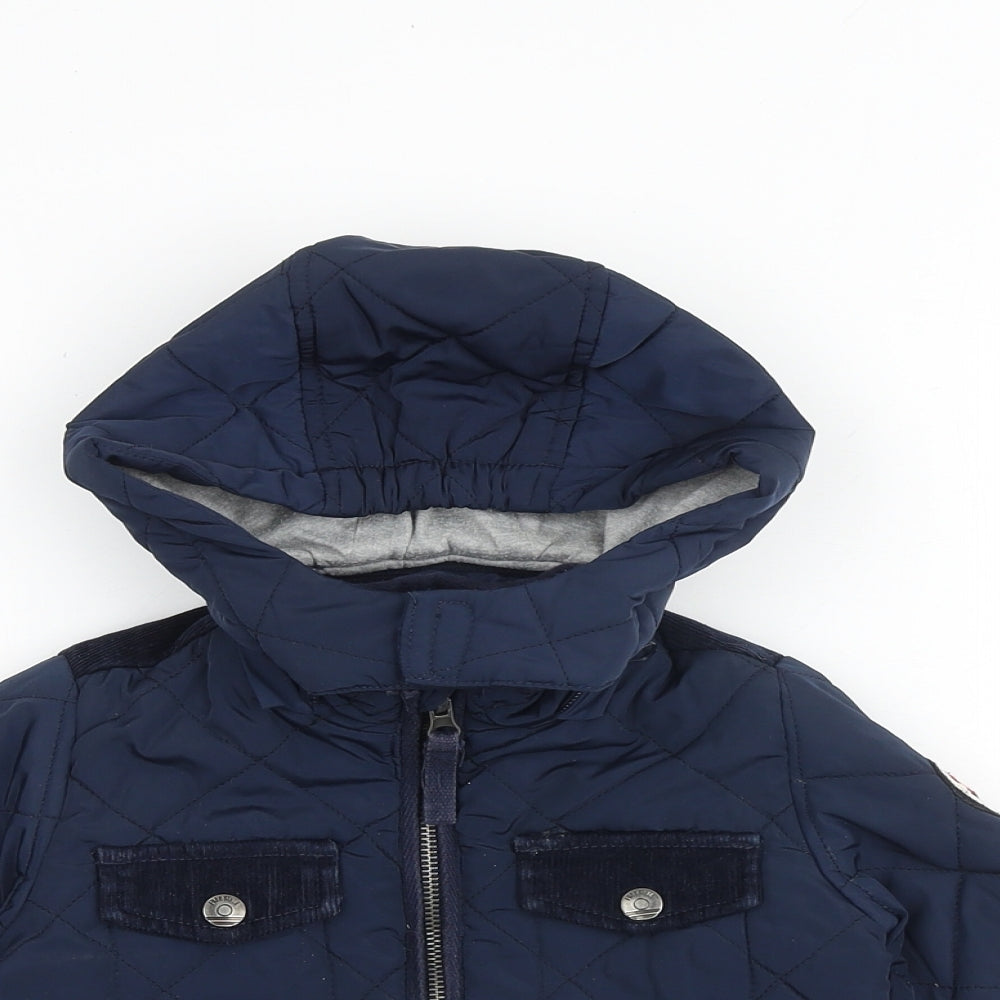 Close-up detail of Freestyle boys’ blue jacket, size 2, years zip