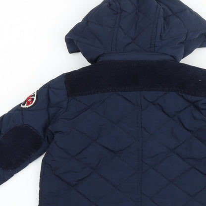 Brand and care label for Freestyle boys’ blue jacket, size 2, years zip