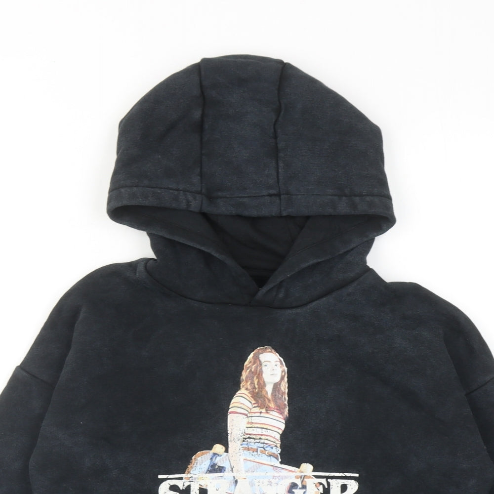 Close-up detail of Stranger Things boys’ black cotton pullover hoodie, size 7-8, years pullover
