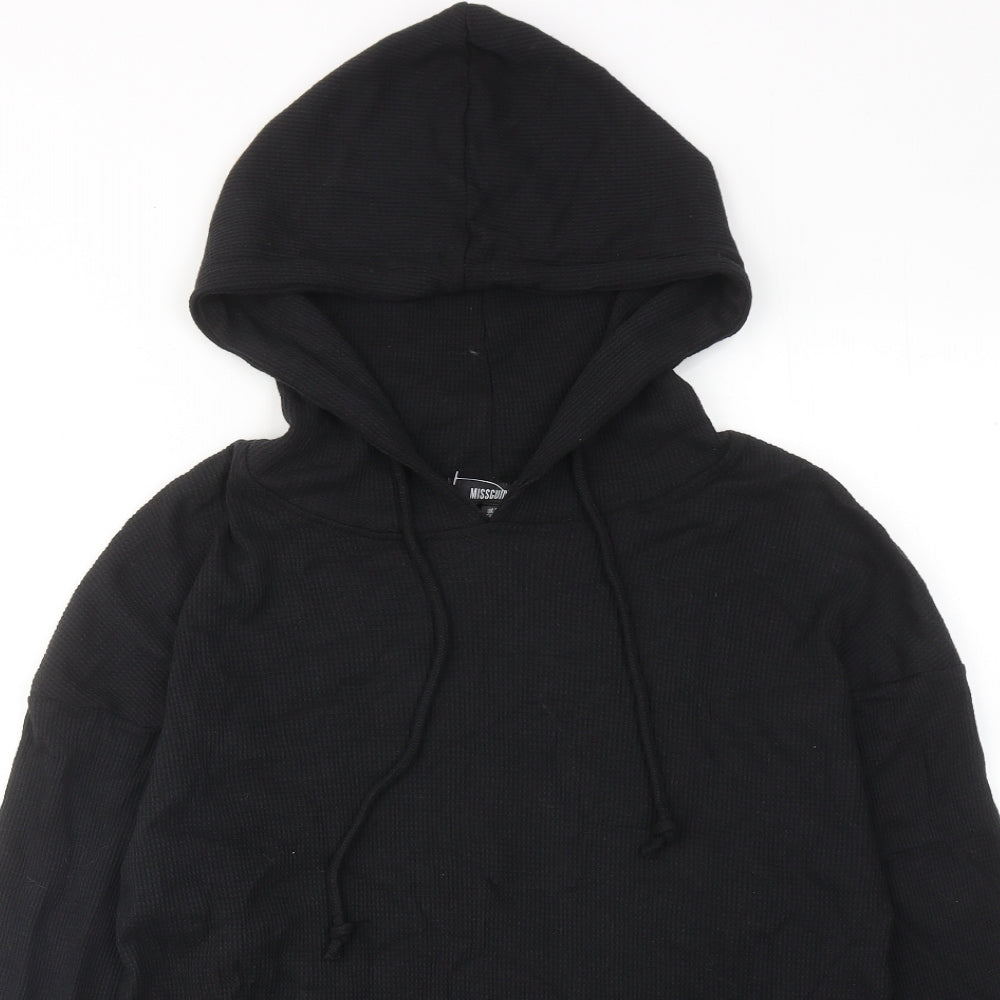 Close-up detail of Missguided women’s black cotton pullover hoodie, size UK 10, pullover