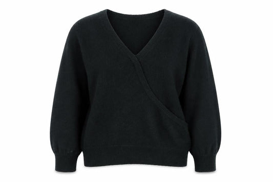 Front view of Miss Selfridge women’s green v-neck acrylic jumper, size UK 6