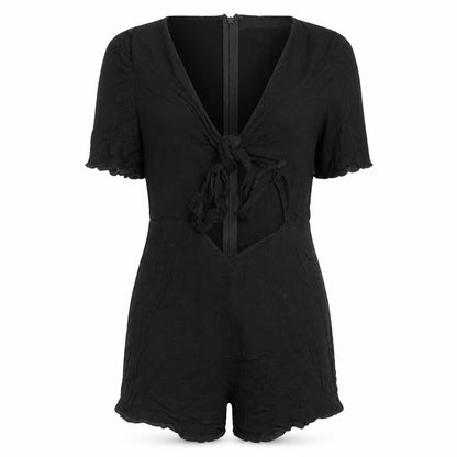 Front view of Missguided women’s black viscose playsuit one-piece, size UK 6, zip