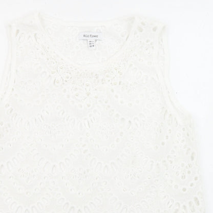 Close-up detail of Wild Flower women’s white polyester basic blouse, size L, crew neck - gemstones