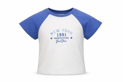 Front view of Marks & Spencer girls’ white 100% cotton basic t-shirt, size 6-7, years round neck pullover