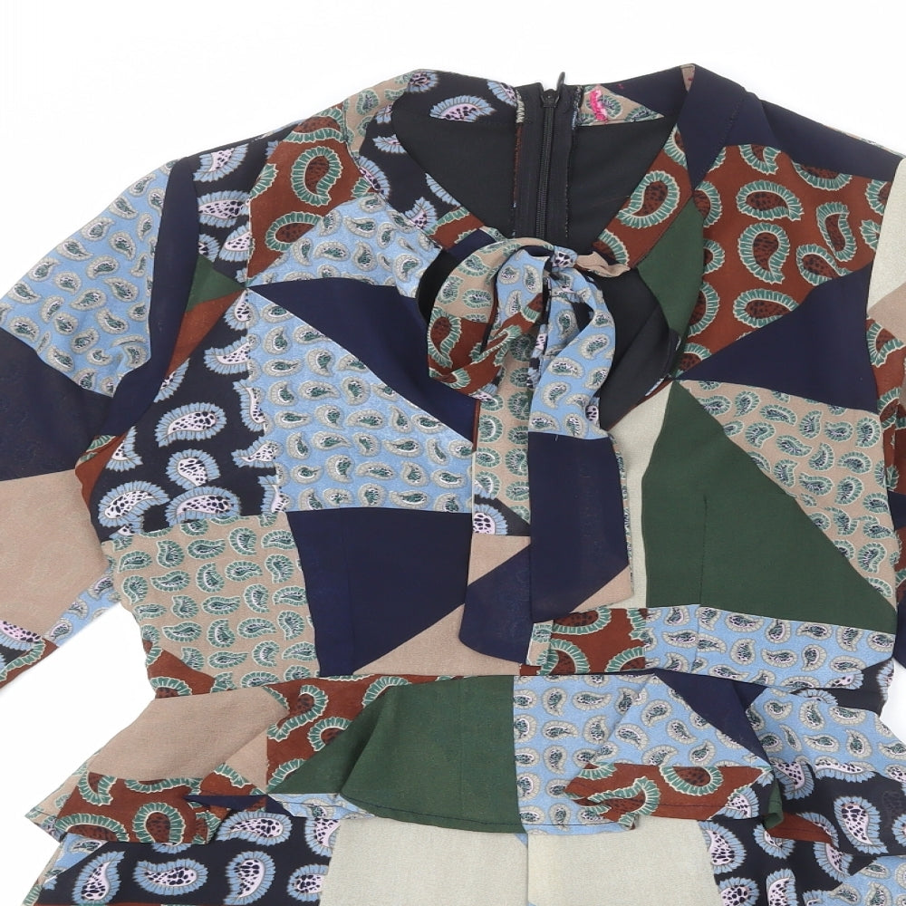 Close-up detail of booho women’s multicoloured geometric polyester romper one-piece, size UK 8 zip - patchwork, tie detail