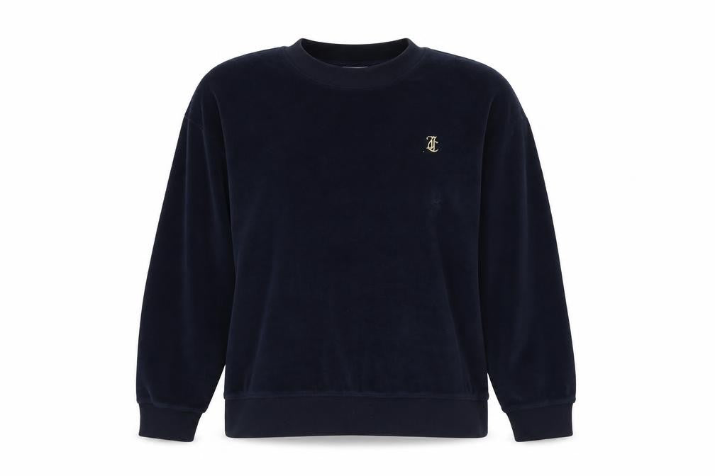 Front view of Juicy Couture women’s blue polyester pullover sweatshirt, size M, pullover