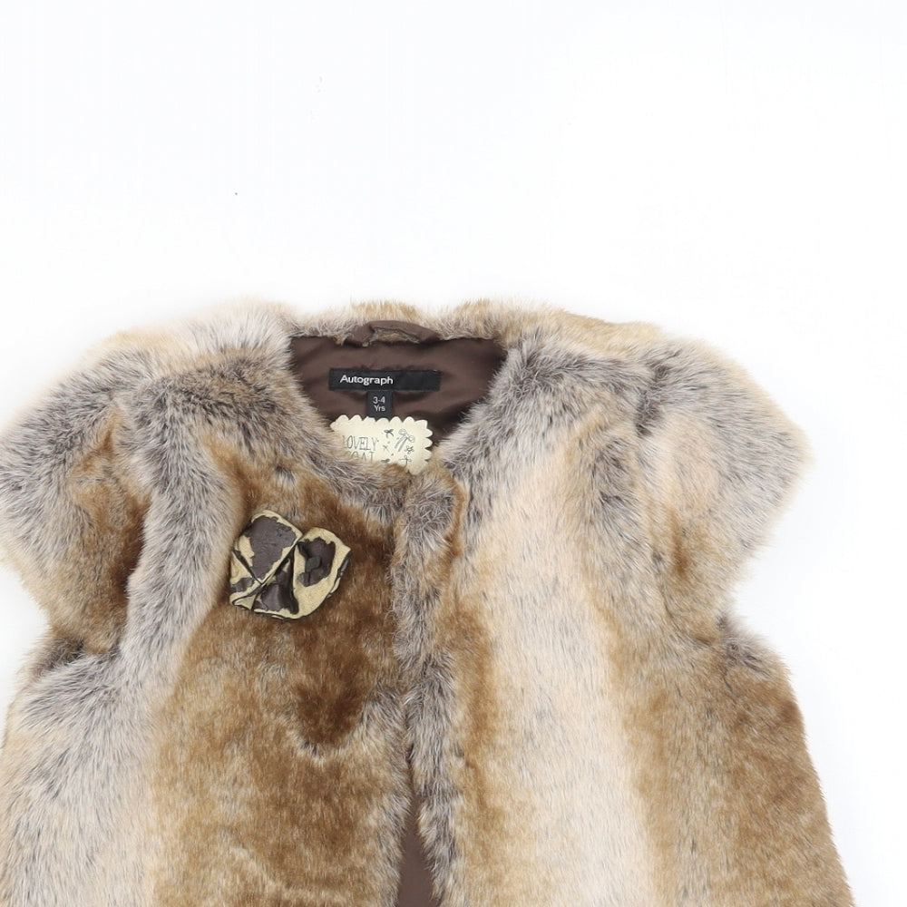 Close-up detail of Autograph girls’ brown jacket, size 3-4, years button - bow