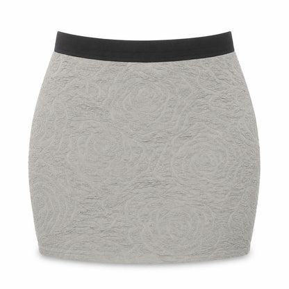 Front view of Silence + Noise women’s green geometric viscose mini skirt, size M