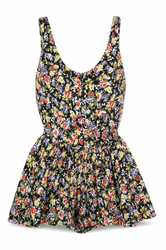 Front view of Miss Selfridge women’s multicoloured floral vinyl playsuit one-piece, size UK 6, button