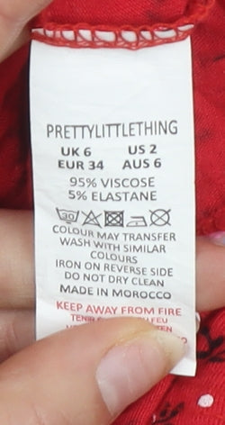 PrettyLittleThing Women’s Red Floral A-Line Mini Dress