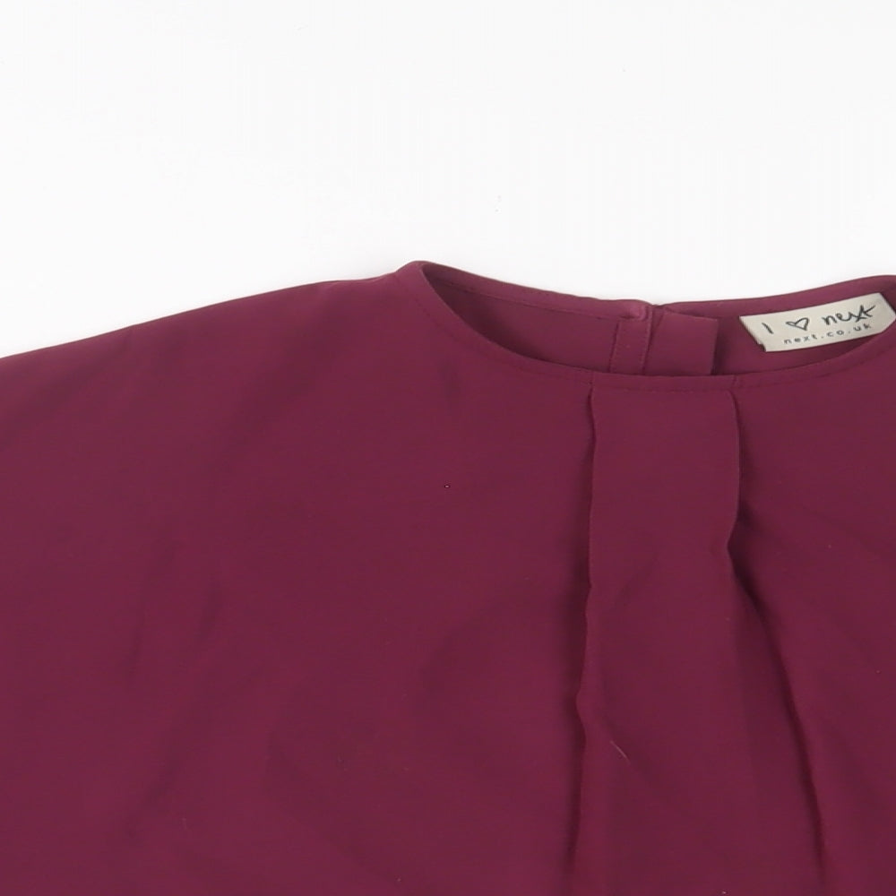 Close-up detail of Next girls’ purple polyester basic t-shirt, size 6, years crew neck button