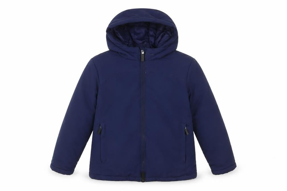 Front view of Castore boys’ blue basic coat coat, size 4-5, years zip - zip pockets