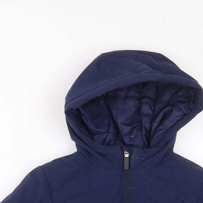 Close-up detail of Castore boys’ blue basic coat coat, size 4-5, years zip - zip pockets