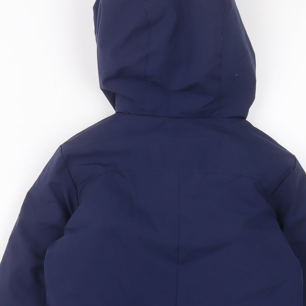 Brand and care label for Castore boys’ blue basic coat coat, size 4-5, years zip - zip pockets