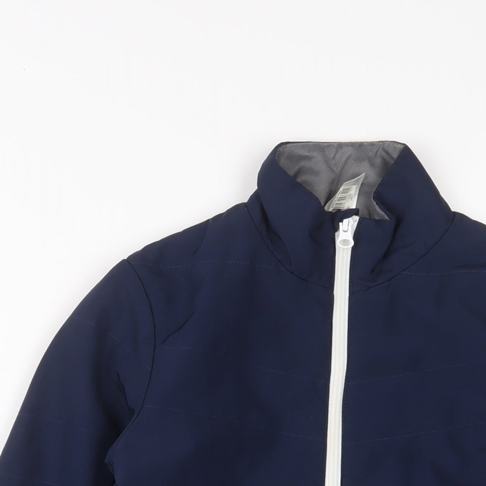 Close-up detail of Decathlon boys’ blue jacket coat, size 10, years zip