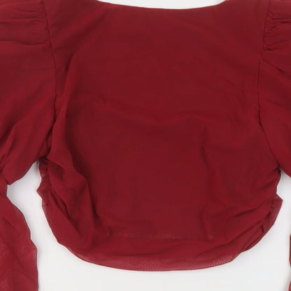 Brand and care label for Ah Polly women’s red polyester basic blouse, size UK 12, square neck
