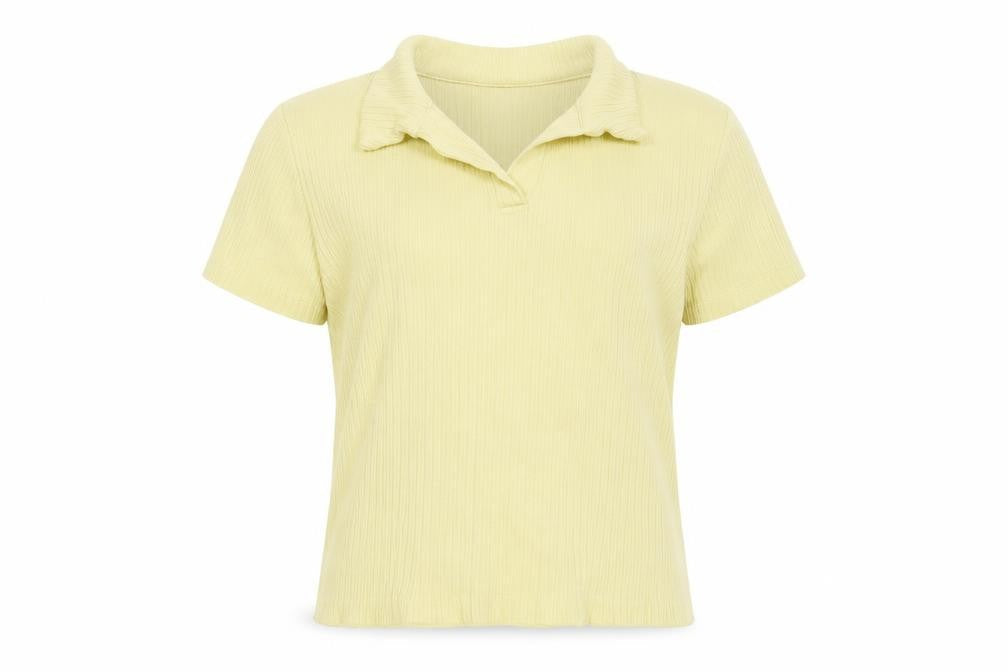 Front view of Zara girls’ yellow polyester basic polo, size 9, years collared pullover