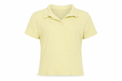 Front view of Zara girls’ yellow polyester basic polo, size 9, years collared pullover