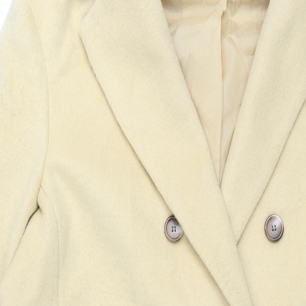 Close-up detail of Albaray women’s yellow overcoat coat, size UK 14, button
