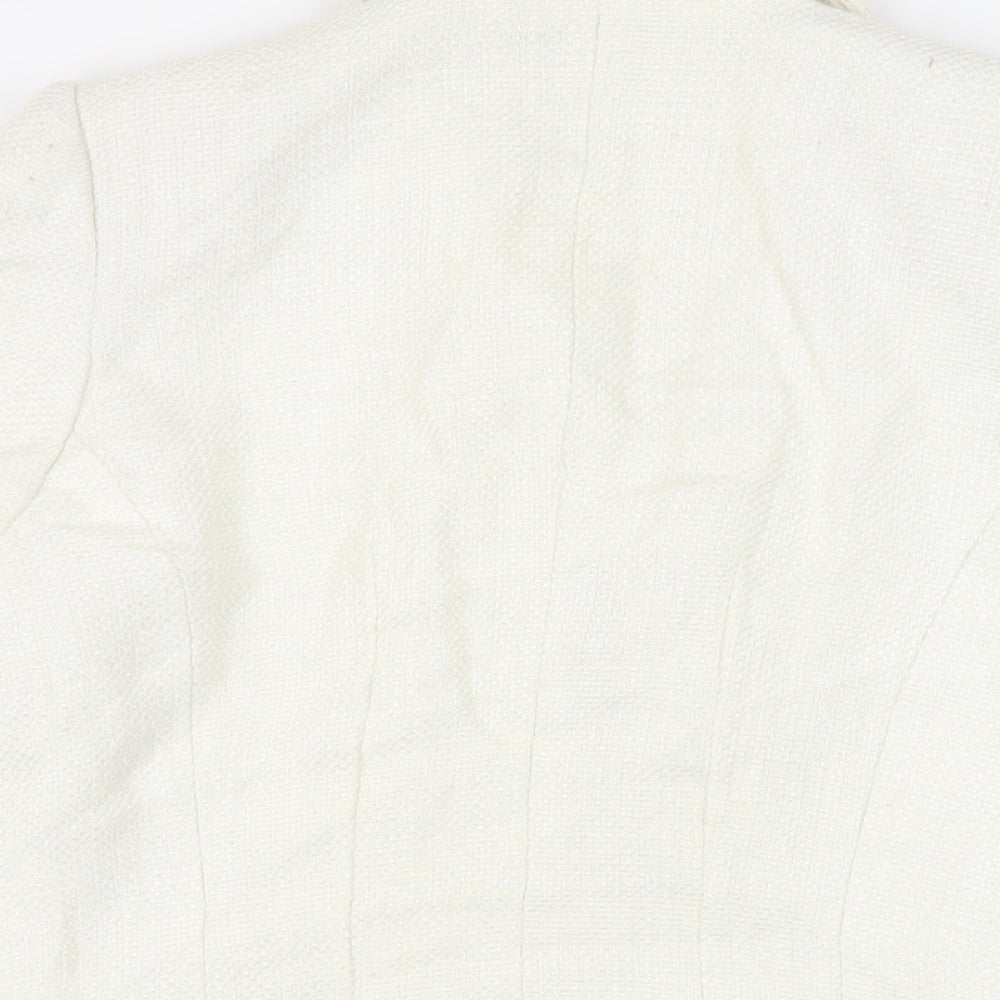 Brand and care label for David Charles girls’ ivory jacket blazer, size 16, years - open