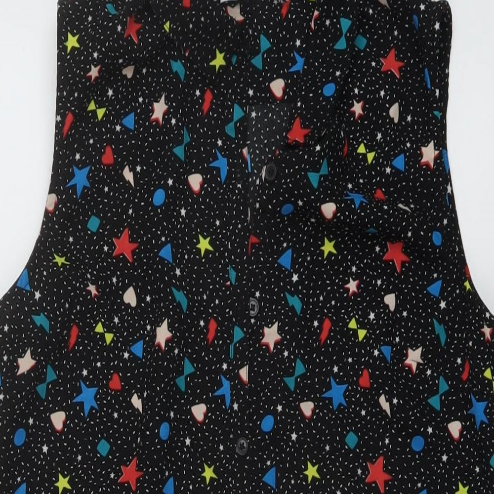 Close-up detail of Marks & Spencer girls’ black geometric polyester basic blouse, size 13-14, years collared button