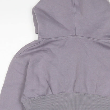 Brand and care label for Missguided women’s purple cotton pullover hoodie, size UK 10, pullover