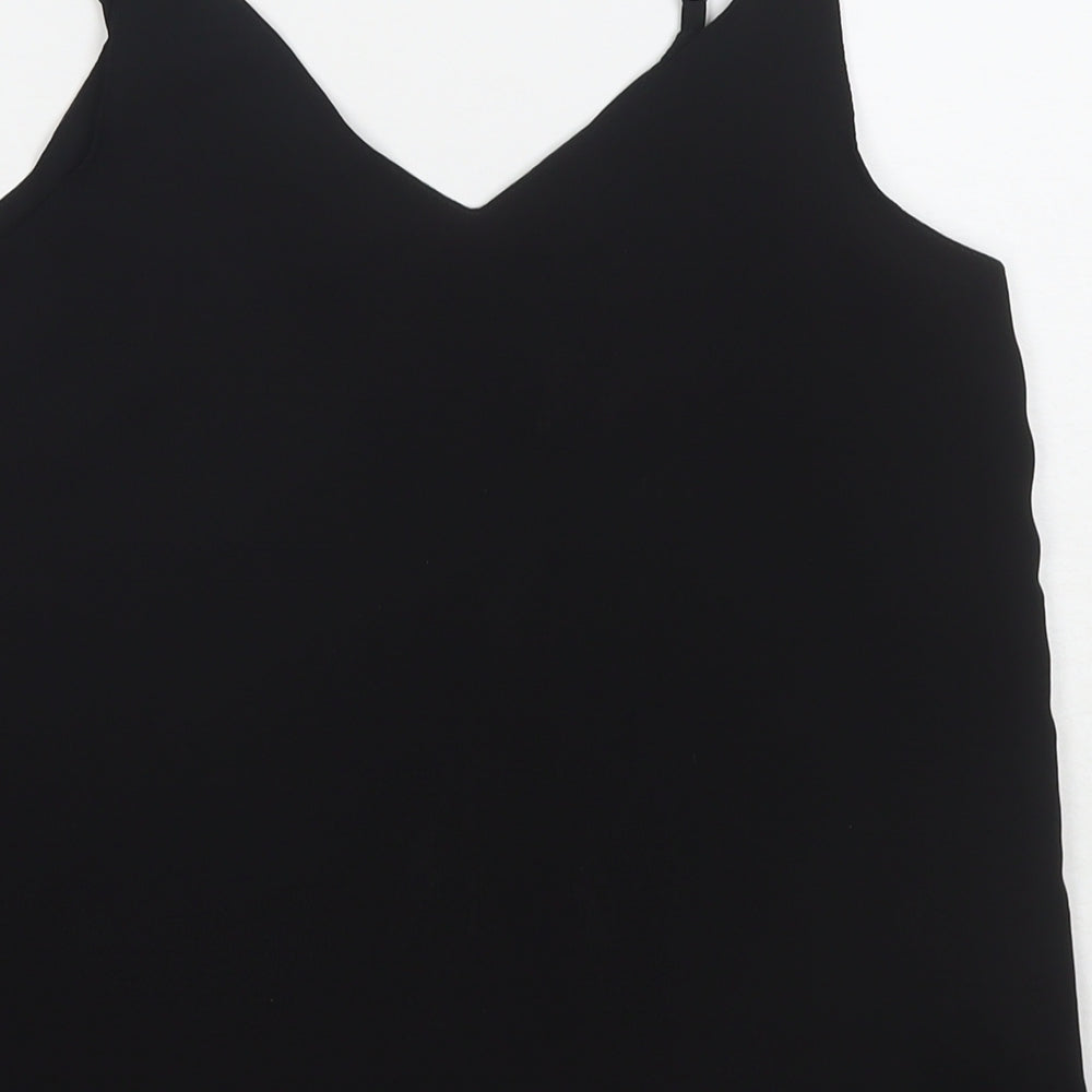 Brand and care label for Cotton:On women’s black polyester basic tank, size XS, round neck