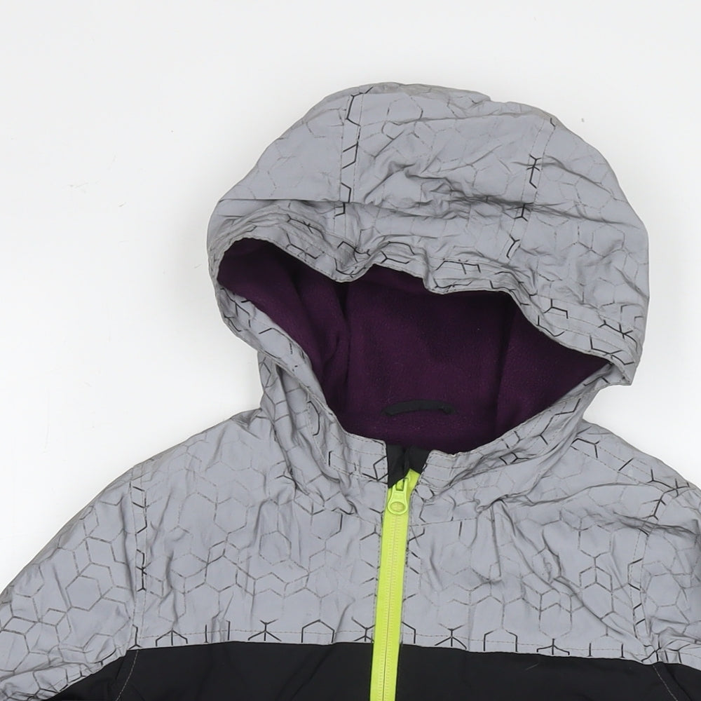 Close-up detail of Baker boys’ black colourblock jacket, size 7, years zip