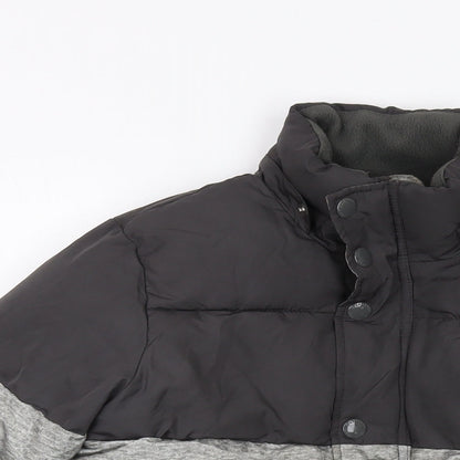 Close-up detail of Gap boys’ grey jacket, size 8-9, years zip