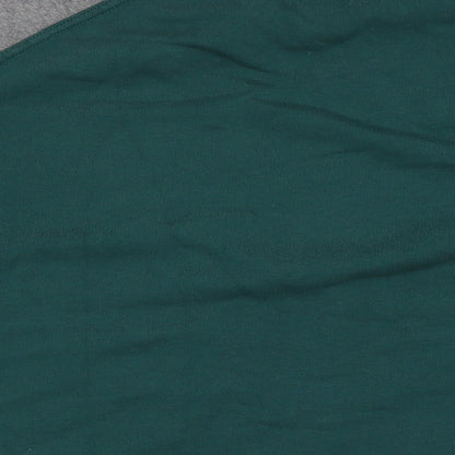 Brand and care label for KIN women’s green cotton pullover sweatshirt, size M