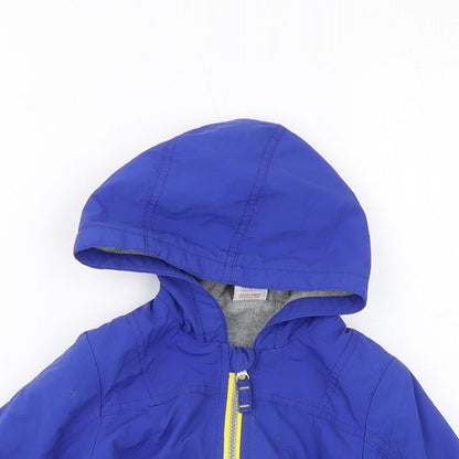 Close-up detail of Mini Club boys’ blue jacket, size 2, years zip