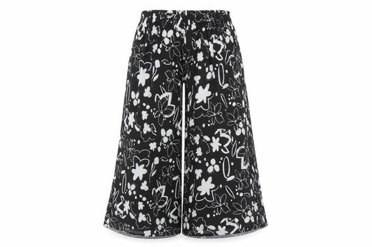 Front view of ASOS women’s black geometric polyester trousers, size UK 10, 22-inch leg regular