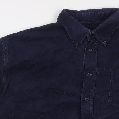 Close-up detail of Camargue men’s blue cotton button-up, size L, collared button