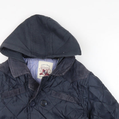 Close-up detail of Hadleigh boys’ blue quilted coat, size 4-5, years button