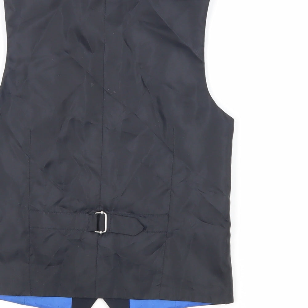 Brand and care label for Next boys’ blue jacket waistcoat, size 8, years button