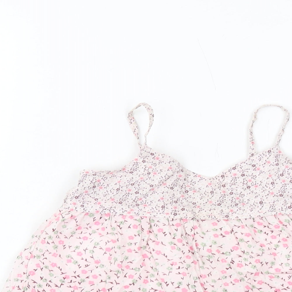 Close-up detail of Gap girls’ pink floral cotton basic tank, size 6-7, years square neck pullover