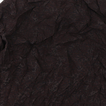 Brand and care label for ASOS men’s brown animal print cotton button-up, size M, collared button