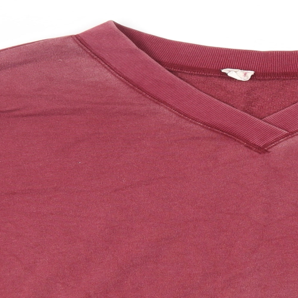 Close-up detail of Juicy Couture women’s pink cotton pullover sweatshirt, size M, pullover