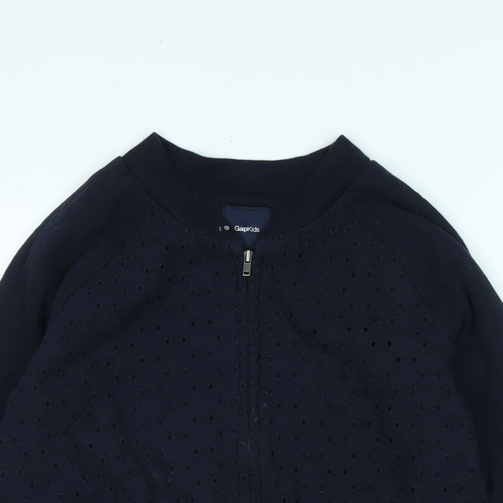 Close-up detail of Gap girls’ blue jacket, size XL, zip - logo