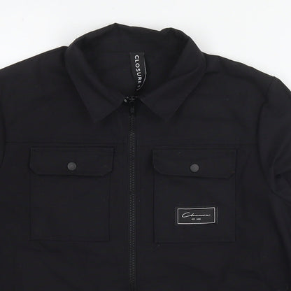 Close-up detail of Closure boys’ black jacket, size 12-13, years zip