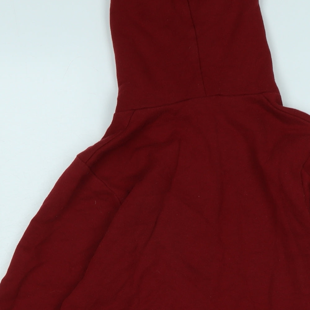 Brand and care label for American Apparel boys’ red jacket size 2xs zip