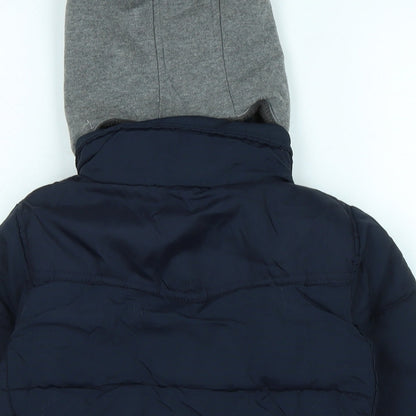 Brand and care label for Next boys’ blue quilted coat, size 5, years zip