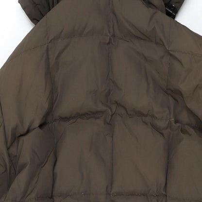 Brand and care label for Woolrich women’s green overcoat coat, size M, zip