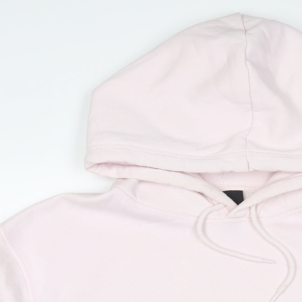 Close-up detail of h7m women’s pink cotton pullover hoodie, size XL, pullover