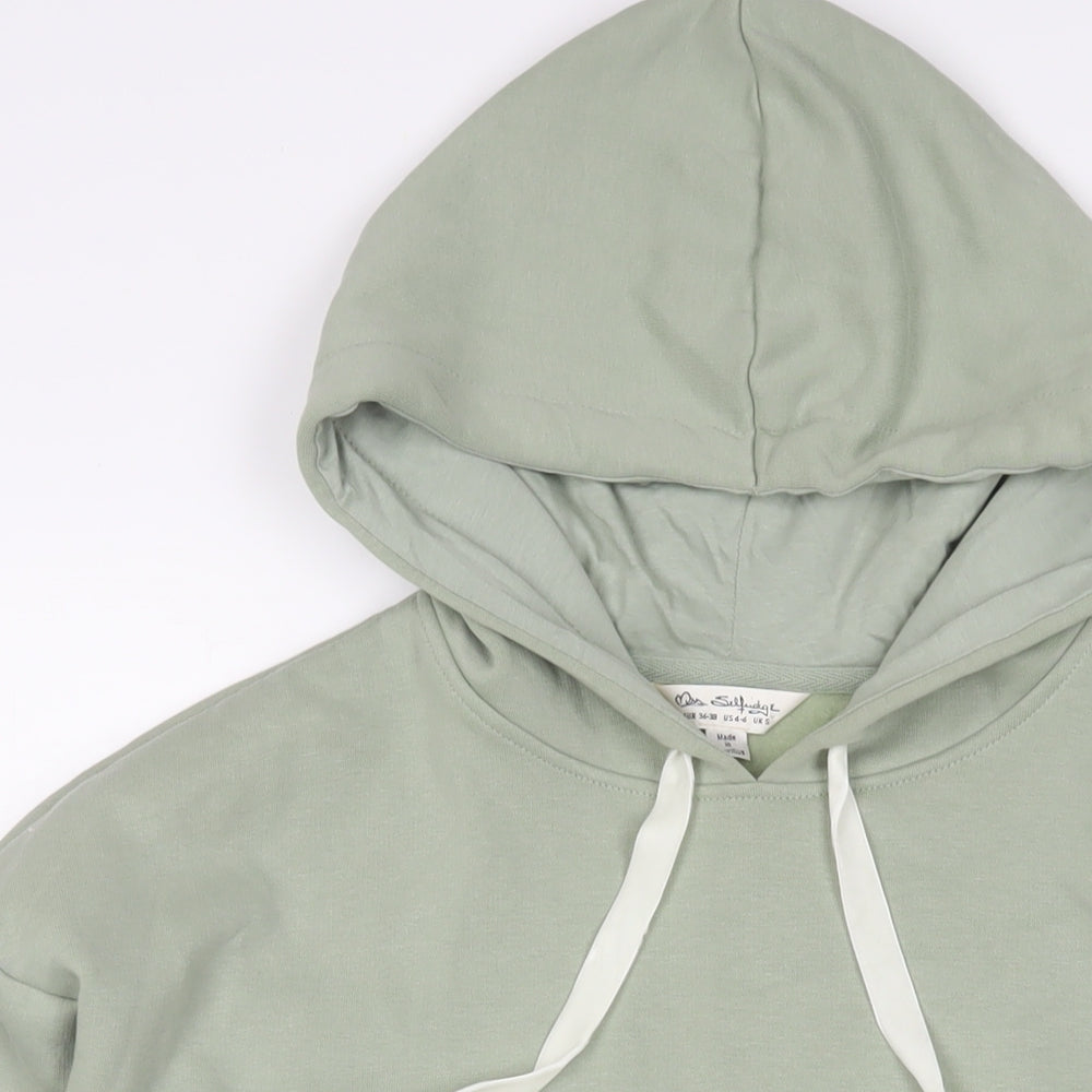 Close-up detail of Miss Selfridge women’s green cotton pullover hoodie, size S, pullover