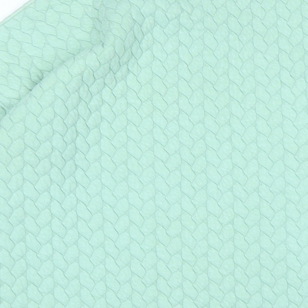 Brand and care label for JD Williams women’s green polyester pullover sweatshirt, size UK 10