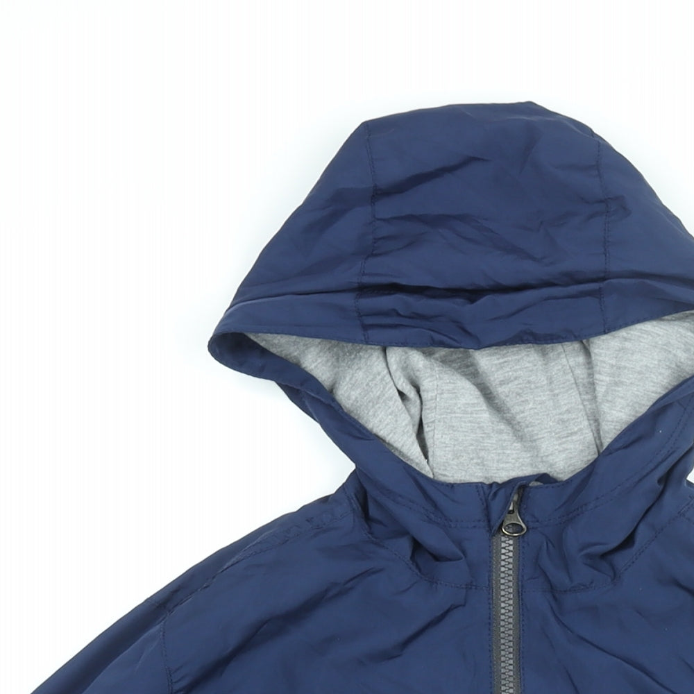 Close-up detail of Gap boys’ blue jacket, size M, zip