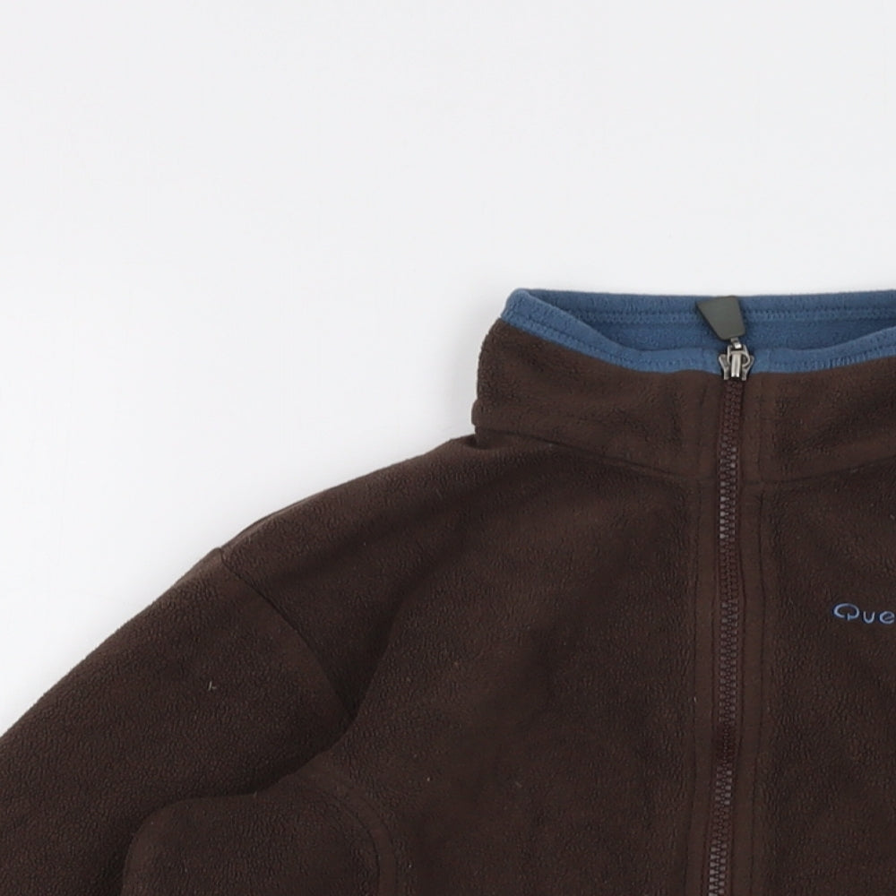 Close-up detail of Quechua boys’ brown jacket, size 12, years zip