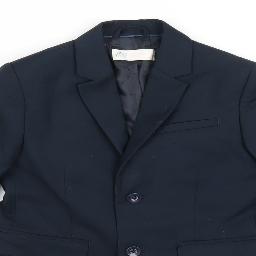Close-up detail of H&M boys’ blue jacket blazer, size 4-5, years button